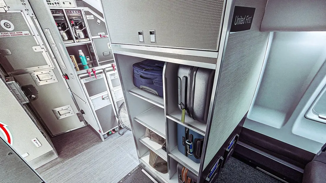 United's New Regional Jet Trades First Class Overhead Bins for a Seven-Bag Closet