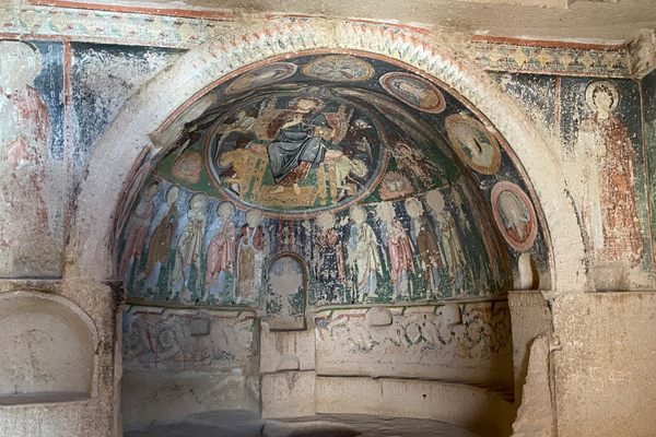 Cappadocia's Three Crosses Church: Frescoes Hidden Above a Wooden Ladder in the Red Valley