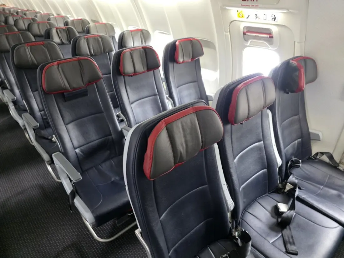 American Airlines app will now auto-move you to a better seat — and top elites can lock in their free snack