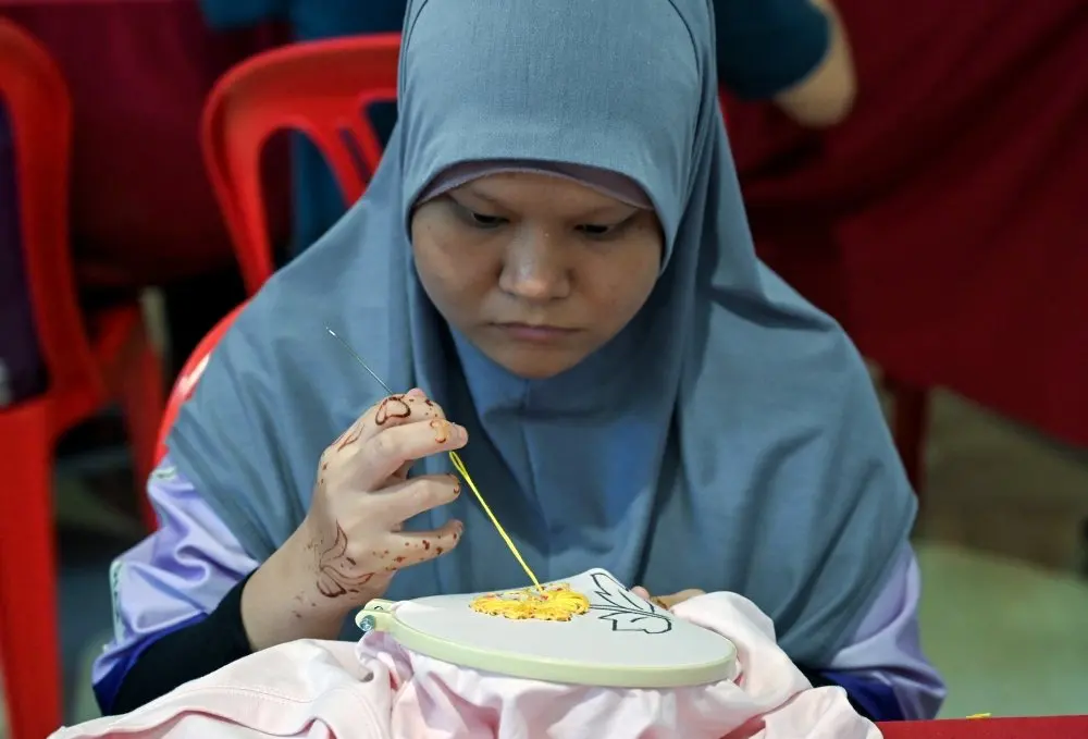In Ipoh, embroidery is opening a path to independence for special needs trainees